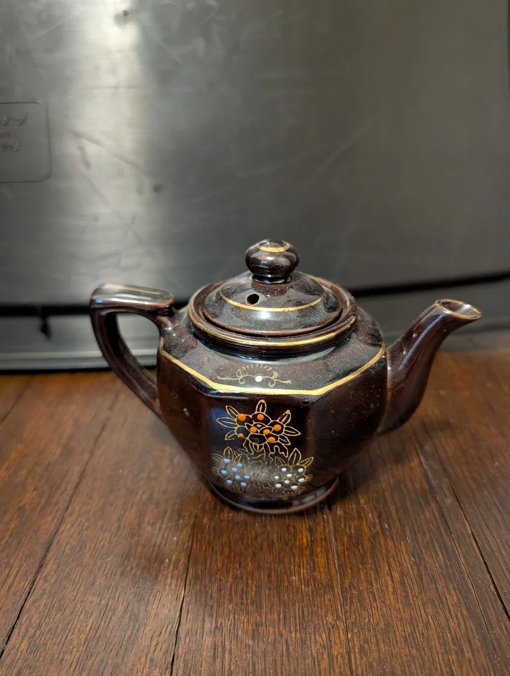 Brown Ceramic Teapot with Hand-Painted Floral Detail